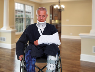 patient sits with casts in a wheelchair for in home care services in southeast michigan